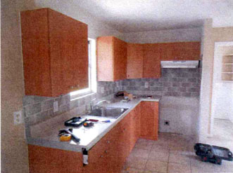 AHF rehab property in Lehigh Acres, FL. View of kitchen.